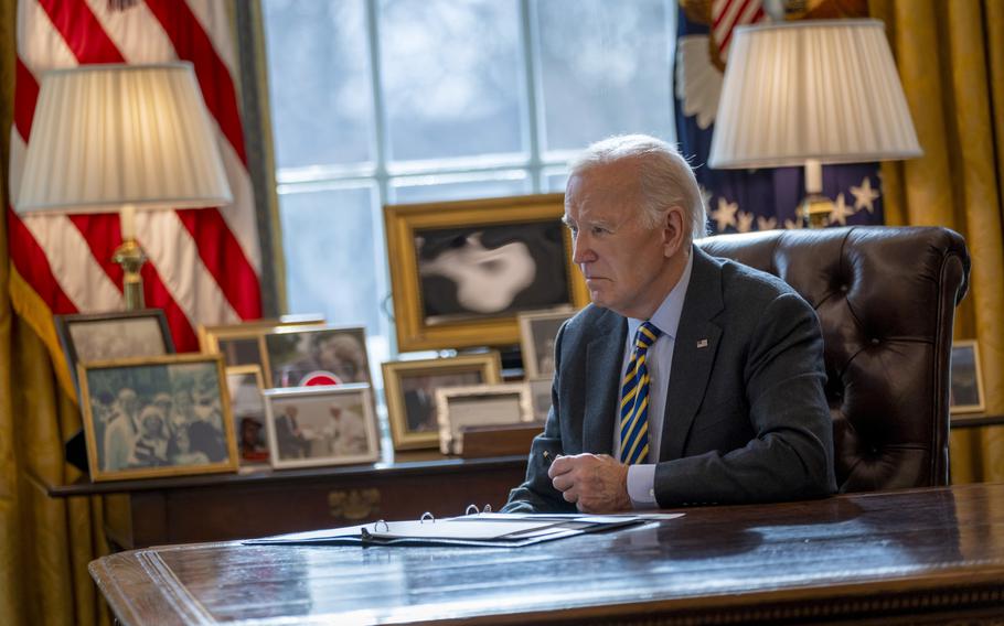 The U.S. president in the Oval Office at the White House in Washington.