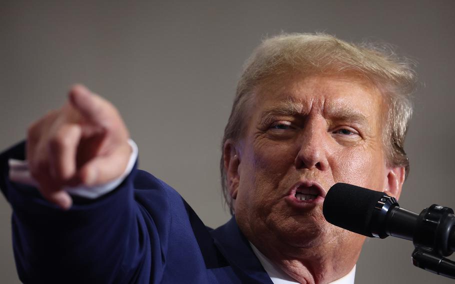 Former President Donald Trump speaks to guests at a rally on April 2, 2024, in Green Bay, Wisconsin.  At the rally, Trump spoke next to an empty lectern on the stage and challenged President Joe Biden to debate him. 