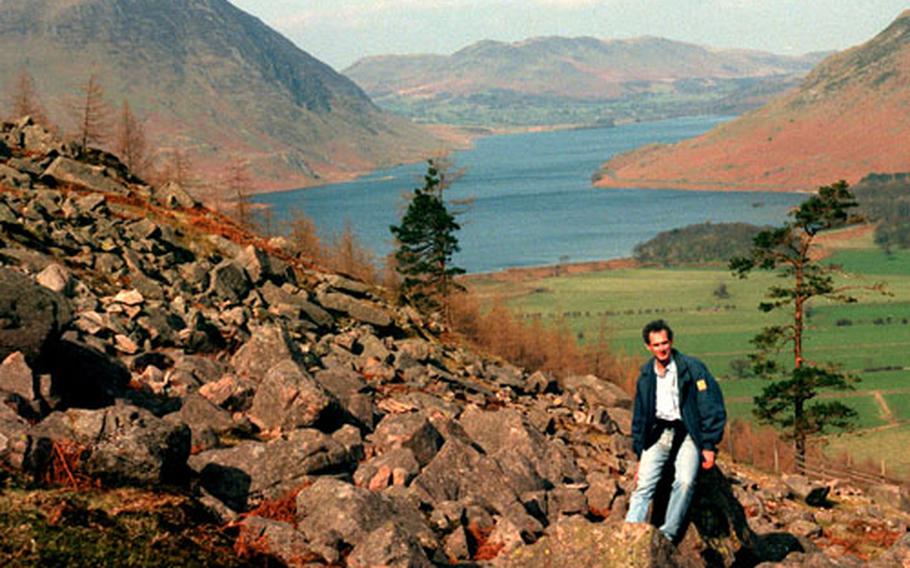 The writer, Richard Moverley, stops for a break overlooking Crummock Water, one of the scenic stops on the Coast to Coast Walk.