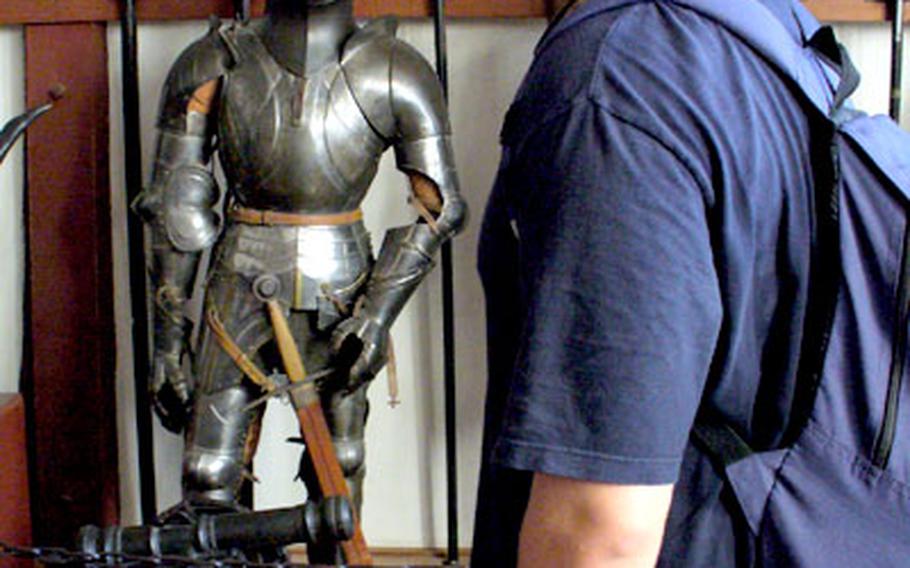 Steve Givens checks out the kind of armor he would have worn if he had had to invade the castle many years ago.