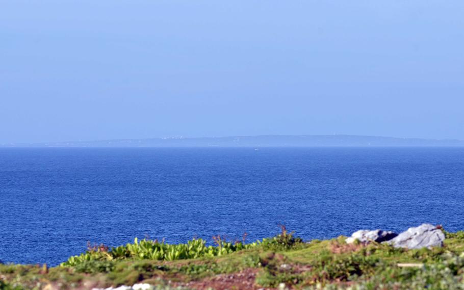 Through the haze, Yoron Island is visible some 20 miles north of Cape Hedo.