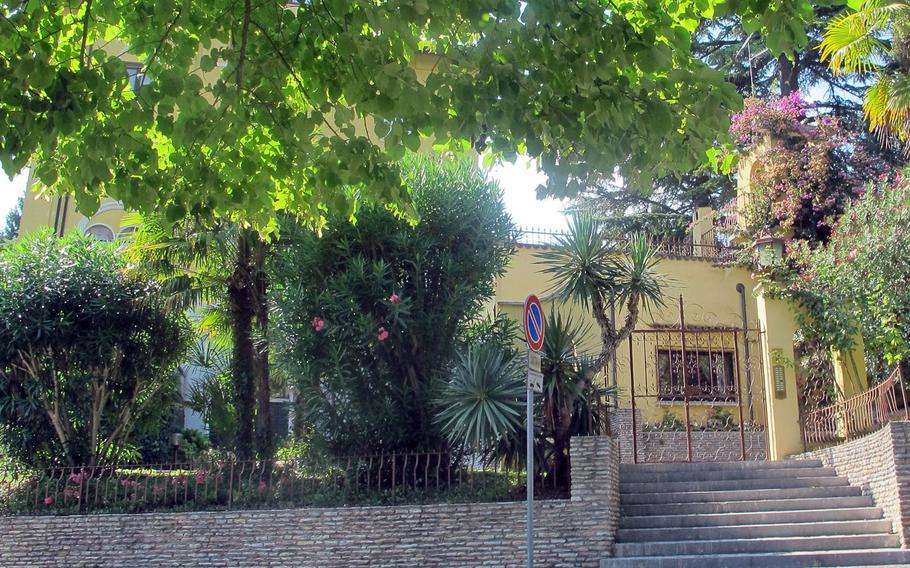Maria Callas' former residence, where she lived with her first husband, is typical of the homes in Sirmione, all green, and lush and landscaped.