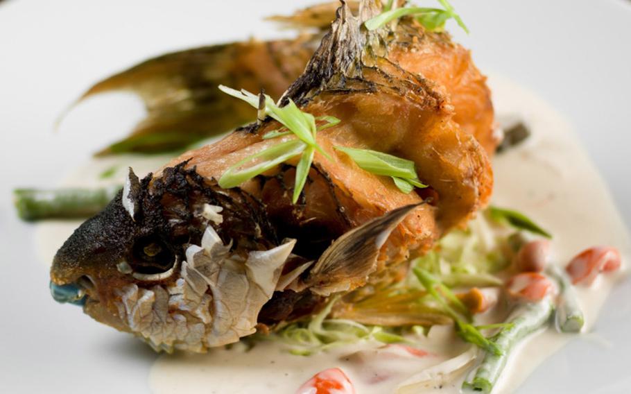 The fried parrot fish at Guam's Meskla Bistro won't leave the average diner hungry.