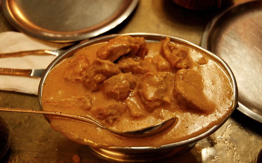 You'll get generous portions of chicken in the shahi korma dish, cooked slowly in a creamy ginger-cashew sauce with yogurt, raisins and saffron at Cafe Maharani. 